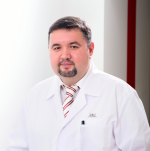 Врач-флеболог Максим Карев